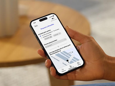 mockuuups-woman-holding-an-iphone-14-pro-mockup_edited.jpg