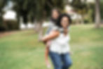 mom giving daughter piggy-back ride