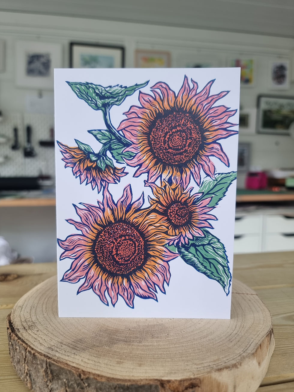 Thumbnail: large open sunflowers in a striking graphic design