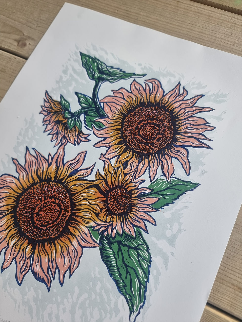 Thumbnail: print of Sunflowers original linocut print in orange, pink, green, purple with a pale blue background