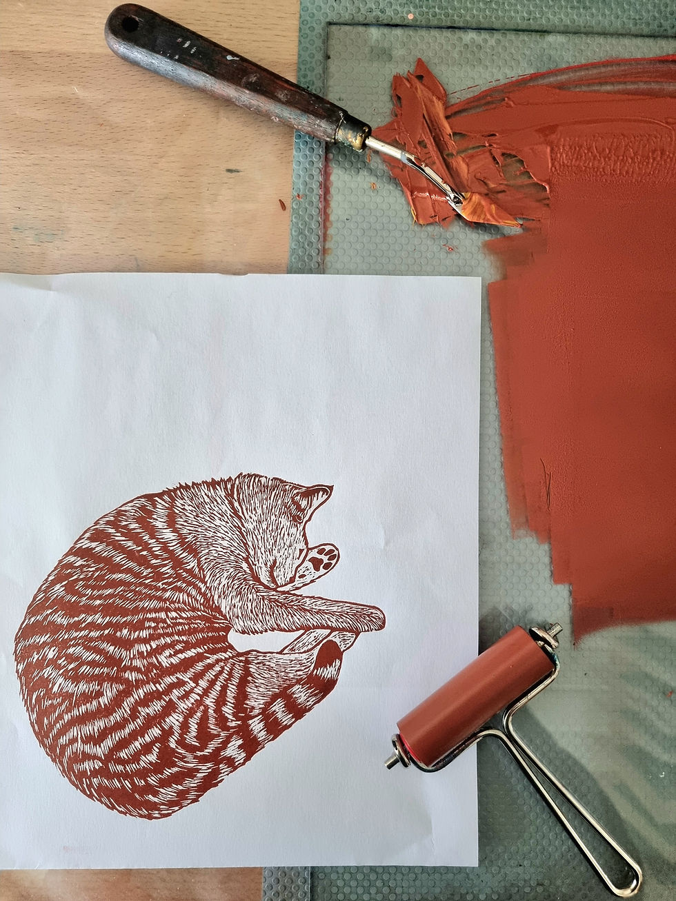 Thumbnail: Charlie original linocut print, features cat curled up asleep with a ball of wool
