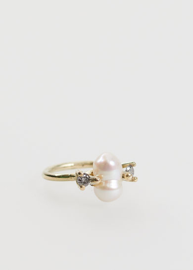 Contemporary baroque ring in 14 k gold with baroque pearl and salt & pepper diamonds. Alternative engagement ring Amsterdam