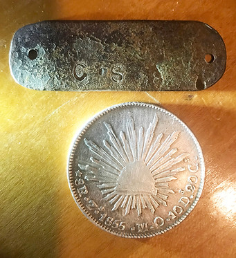 CSA tag and back of Mexican silver dollar.jpg