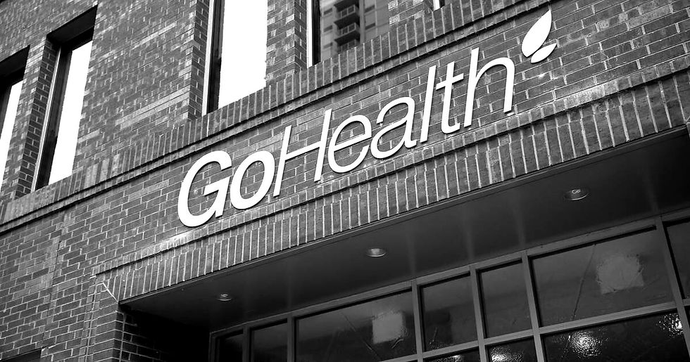 Eye-level view of a modern office building with GoHealth logo
