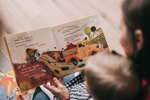 Parent Reading to Young Child