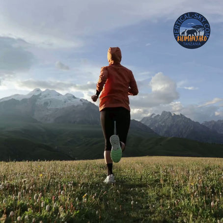 Lady running to the mountains with Vertical Sky