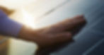Close up of an young engineer hand is checking an operation of sun and cleanliness of phot