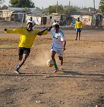 Playing football in Kalingalinga