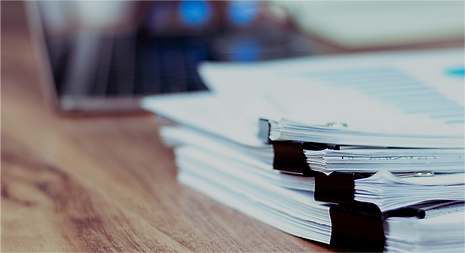 Stack of documents placed on a business desk in a business office. のコピー 3 465_3x.png