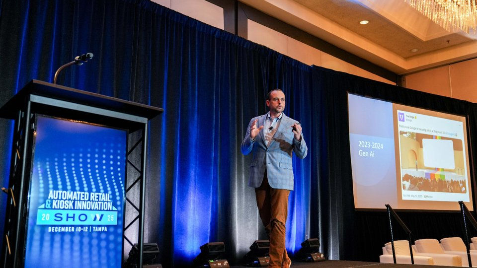 An image of Steven King on stage presenting his keynote speech from the Automated Retail and Kiosk Innovation Show, 2025