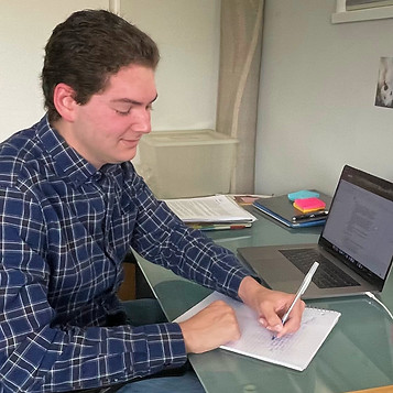 Jake working at his desk.