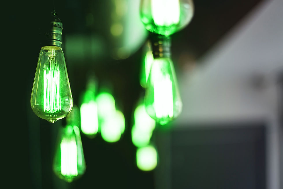 wide-selective-closeup-shot-of-illuminated-light-bulbs-hanging-from-a-ceiling copiar.jpg