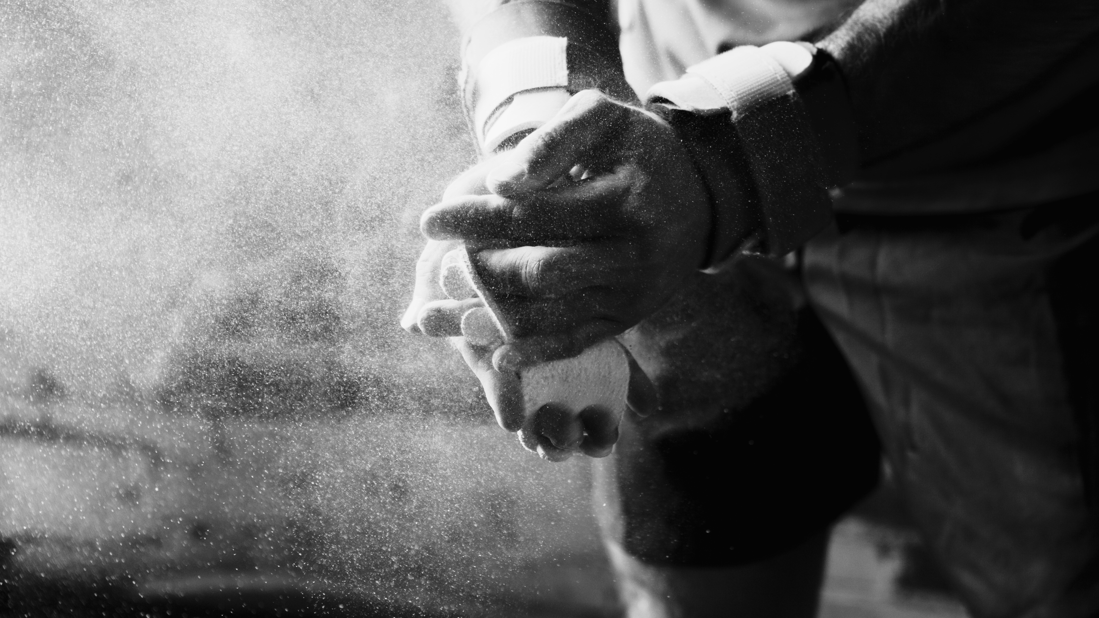 Man clapping hands with chalk before workout at the gym My Site 1 Copy