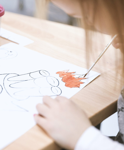 Girl Painting in Art Class