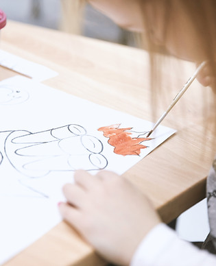 Girl Painting in Art Class