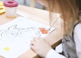 Girl Painting in Art Class