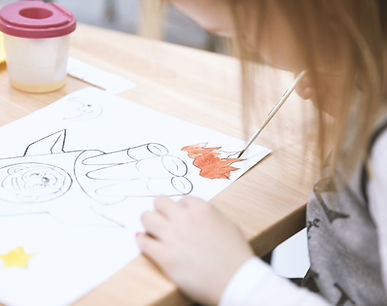 Girl Painting in Art Class