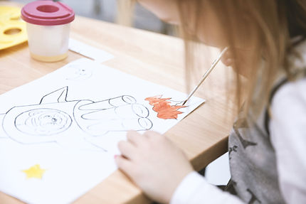 Girl Painting in Art Class