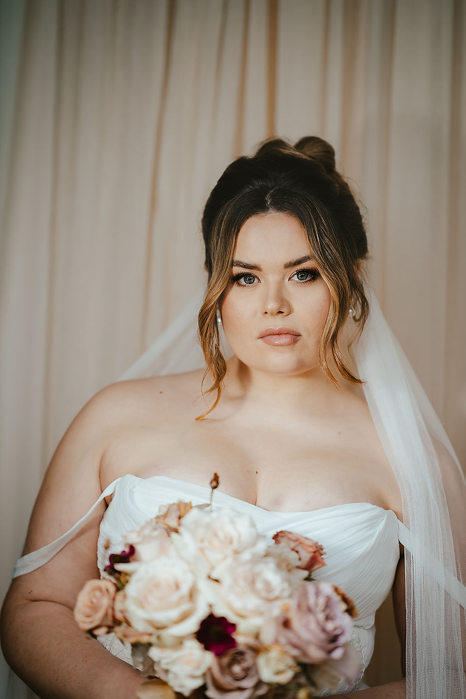 bridal model against a draped background