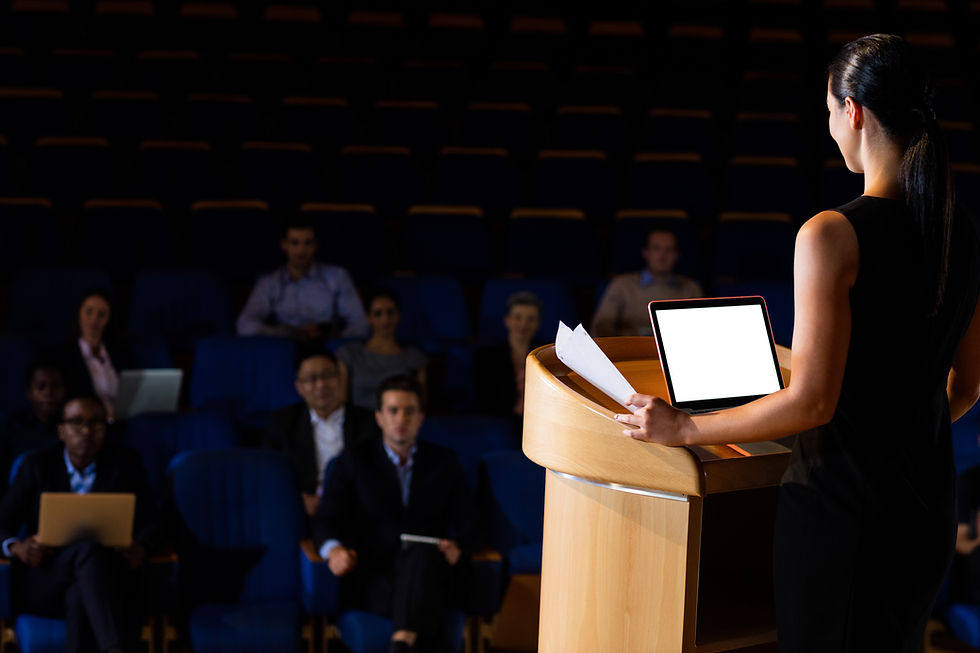 female-business-executive-giving-speech (2).jpg