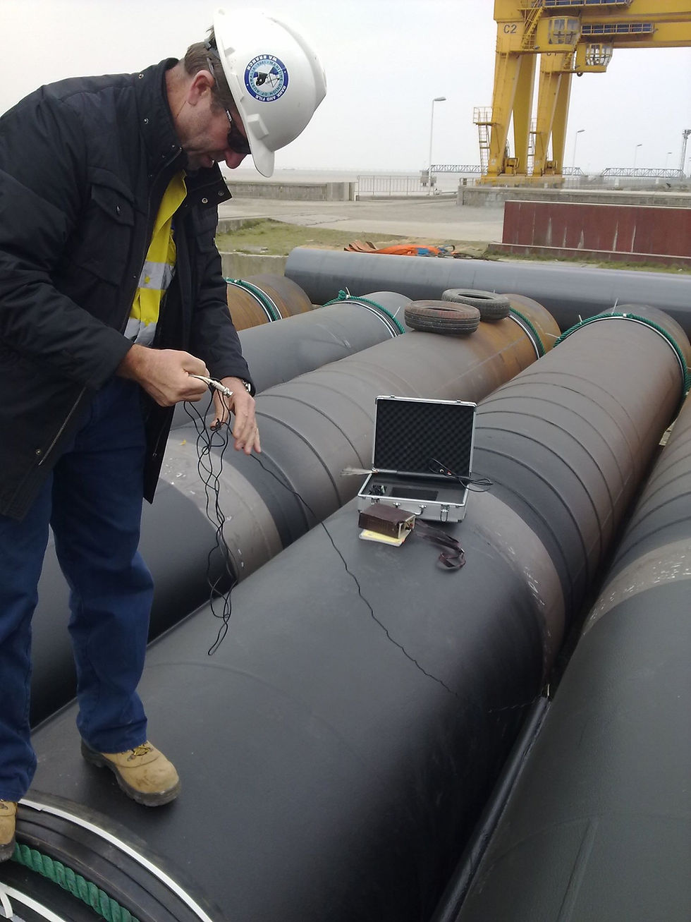Coating of steel pipes/tubular piles