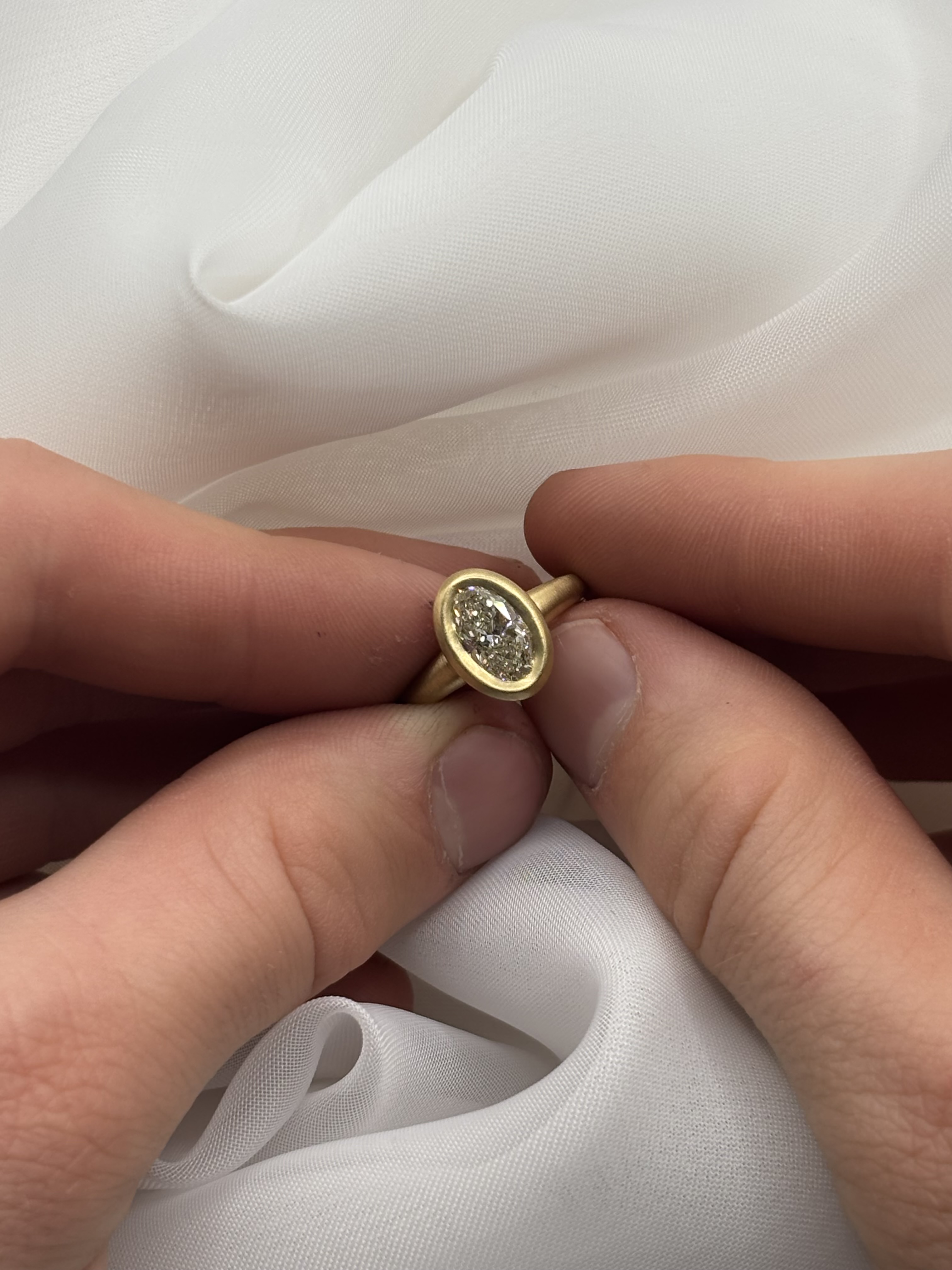 A magnificent 1.5 carat natural diamond engagement ring radiating brilliance and clarity.