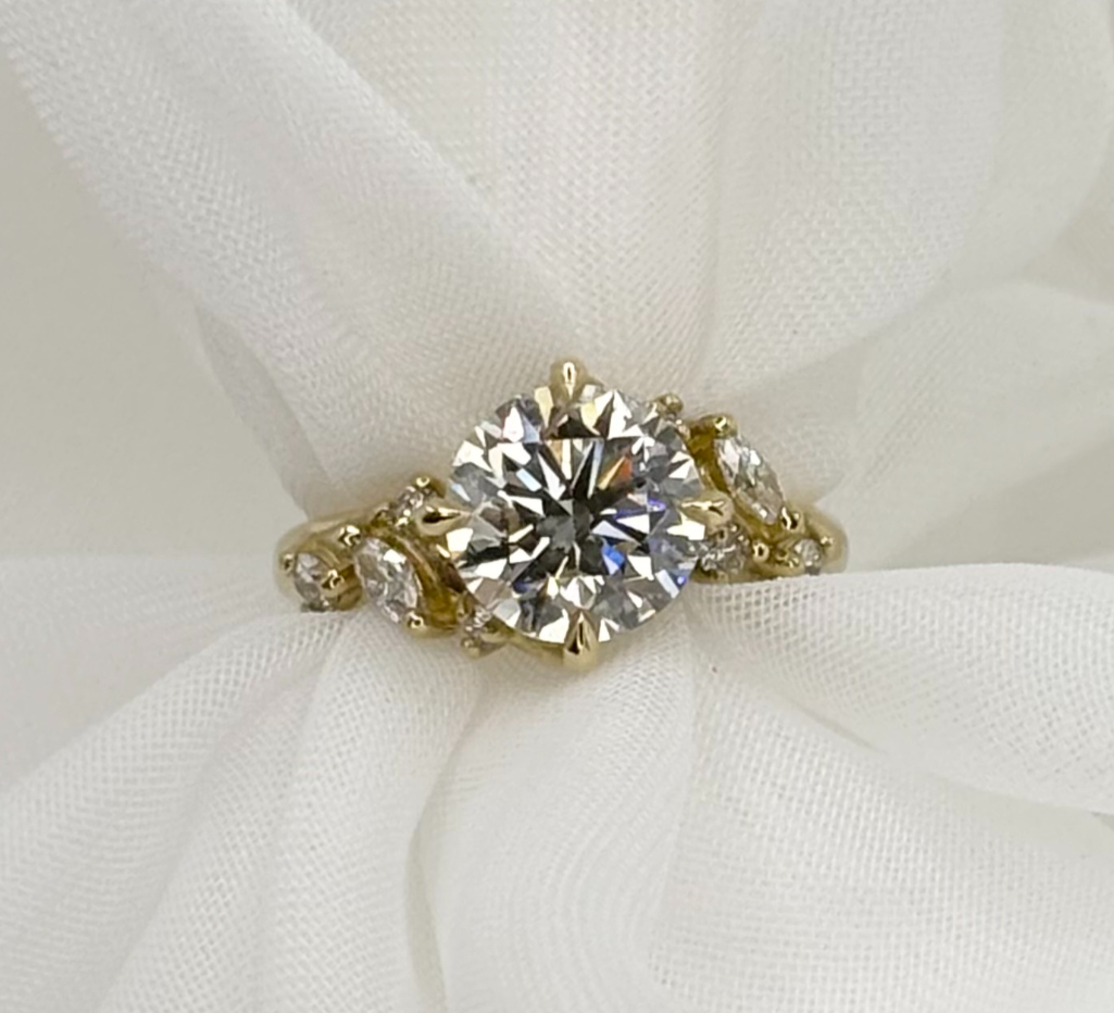 A stunning brilliant-cut natural diamond captured against a soft velvet background.