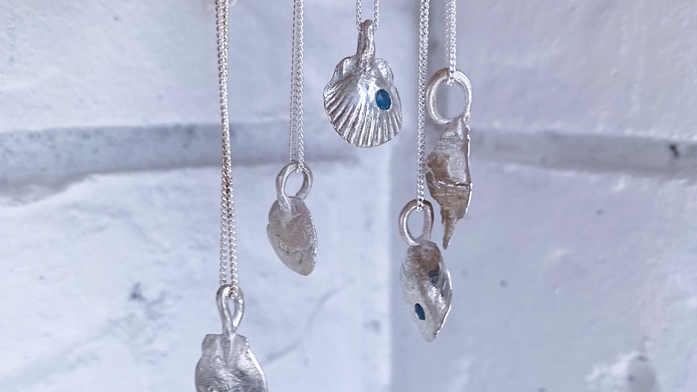 Eye-level view of stunning Byron Bay beach with waves crashing on rocky shore