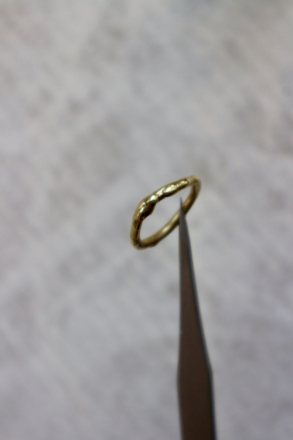 Organic style molten brass ring