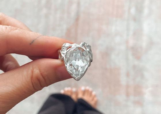 Handcrafted one of a kind using sterling silver and a vintage Swarovski Crystal from my collection.