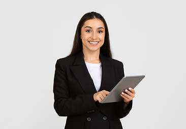 Cheerful young businesswoman in black suit holding digital tablet , d smiling at camera, s