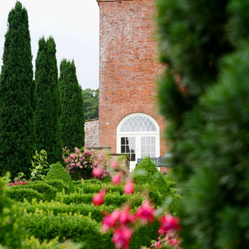 Hopton Hall Summer Opening - garden and building view. By Adrian Ball