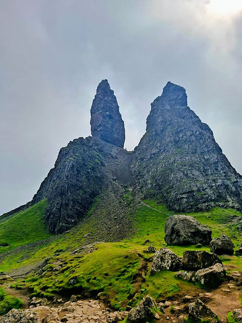 The Storr, a rocky mountain on Isle of Skye, Scotland, under cloudy skies.