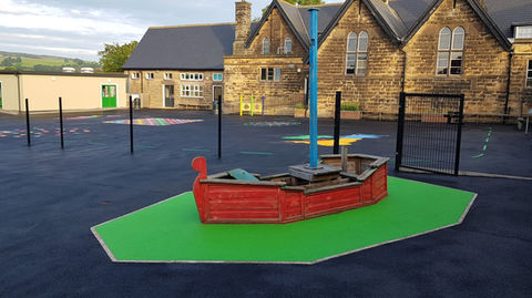 Playground and sport surfaces installation by Johnson Surfacing.