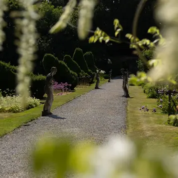 Explore the Hopton Hall gardens and take a leisurely stroll through the grounds - garden statues and path