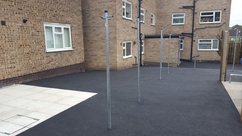 Resin bound and tarmac surfacing for commercial property by Johnson Surfacing