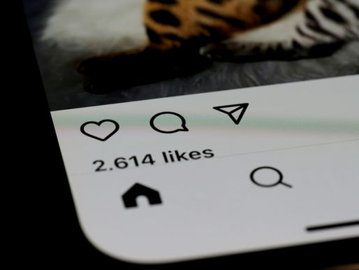 Photo by Brett Jordan on Unsplash. Description: unidentifiable social media post with 2,614 likes.