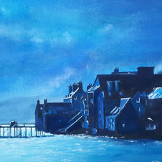 Dark buildings and a dock at waterside, bathed in blue hues. Soft clouds fill the sky, creating a serene, moody atmosphere.