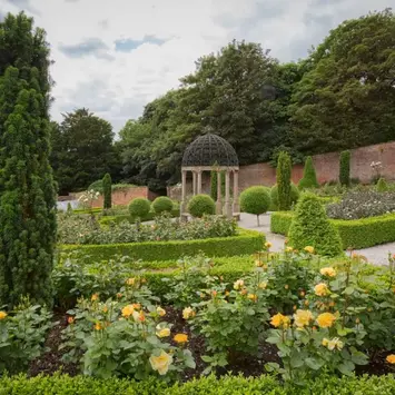 Stone gazebo in Hopton Hall's rose garden