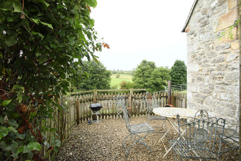 Dumble Cottage Pation Area at Netherton Hall Holiday Cottages