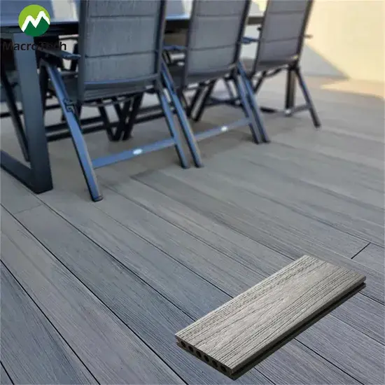 Professional installation of co-extruded WPC decking in a commercial outdoor landscape.