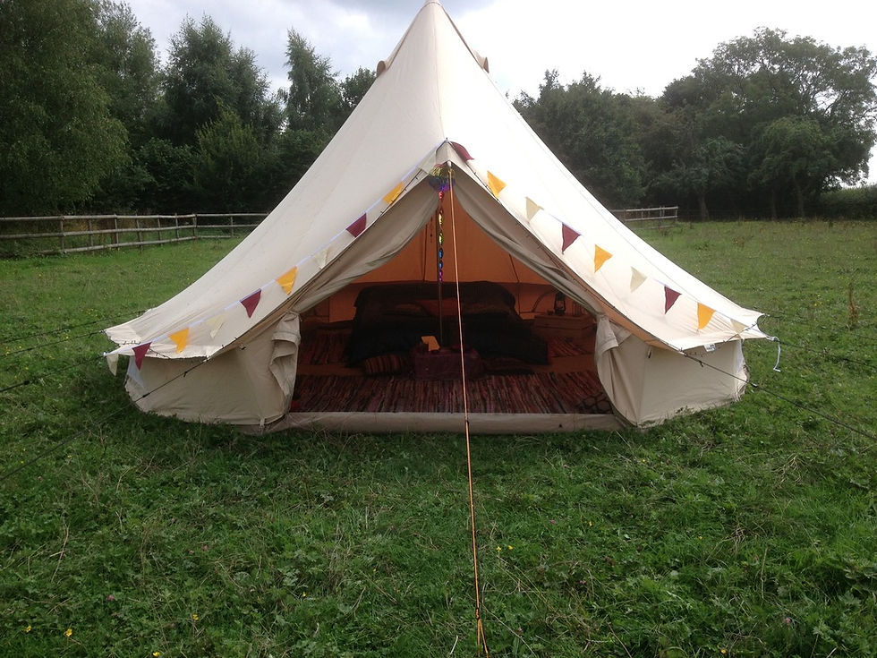 Thumbnail: Bell tent with bunting, wooden floor