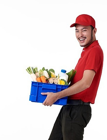 asian-delivery-man-wearing-red-uniform-holding-fresh-food-basket-isolated-white-wall_74952