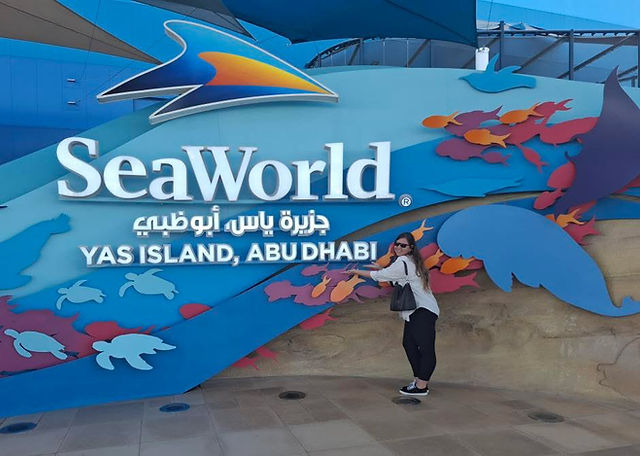 woman standing outside Seaworld in Abu Dhabi