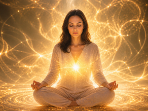 A woman meditates, sitting cross-legged with eyes closed, surrounded by glowing golden light patterns, creating a serene, mystical atmosphere.