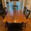 Thumbnail: Gorgeous Refinished Farmhouse Trestle Table Dining Set With 1 Leaf (Sold)