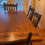 Thumbnail: Gorgeous Refinished Farmhouse Trestle Table with 6 Chairs Dining Set (Sold)