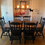 Thumbnail: American Drew Refinished Trestle Table with 6 Chairs and 2 Leaves (Sold)