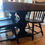 Thumbnail: Gorgeous Refinished Farmhouse Trestle Table with 2 leaves and 6 chairs (Sold)