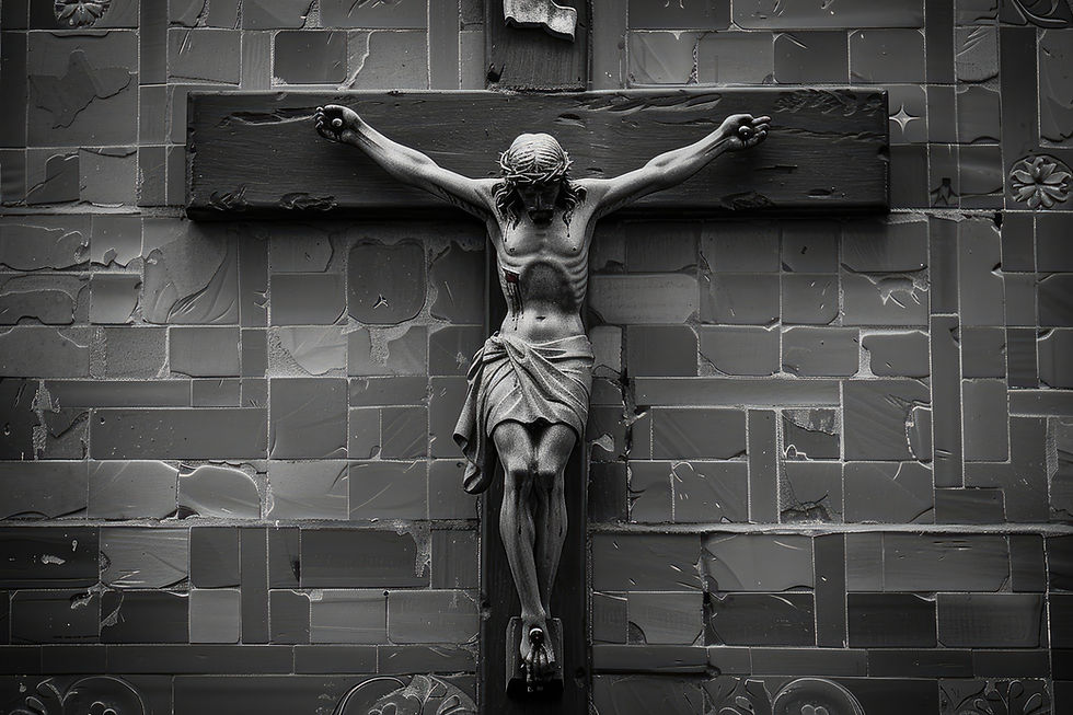 Crucifix of Jesus against a textured, dark gray wall. The sculpture shows Jesus with a crown of thorns, exuding a solemn, somber atmosphere.